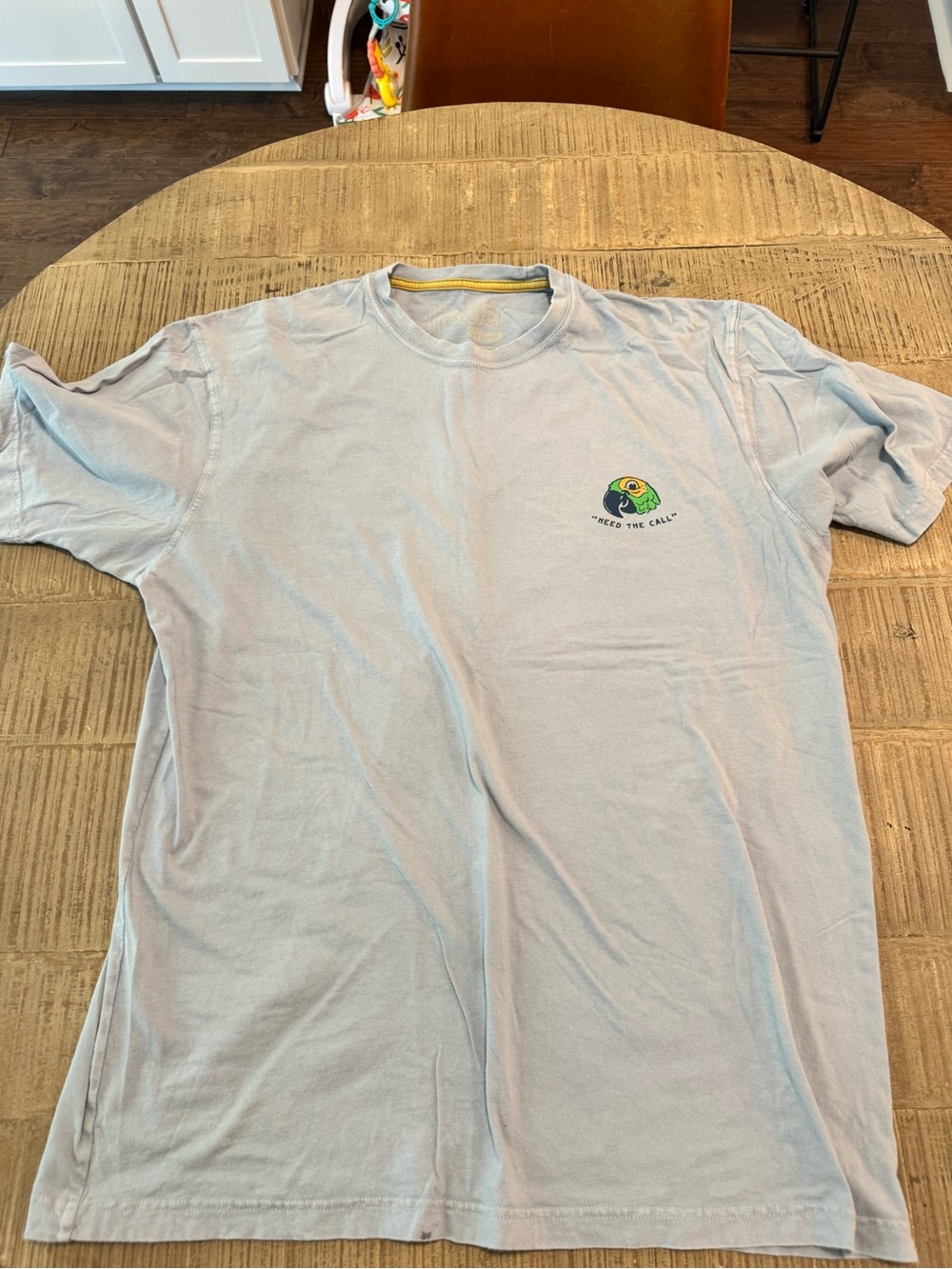 Howler Brothers Pale Blue Short-Sleeve Tee with Small Parrot Graphic